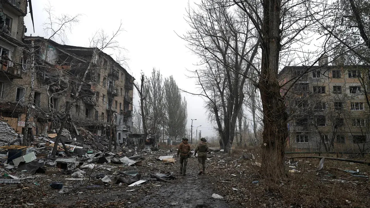 Ukrainian soldiers on patrol in frontline city of Avdiivka during Russian offensive